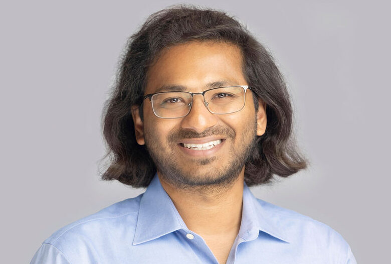 Headshot of Prateek Mittal in light blue shirt