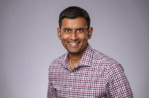 Portrait of Computer Science Professor Arvind Narayanan wearing a plain shirt.