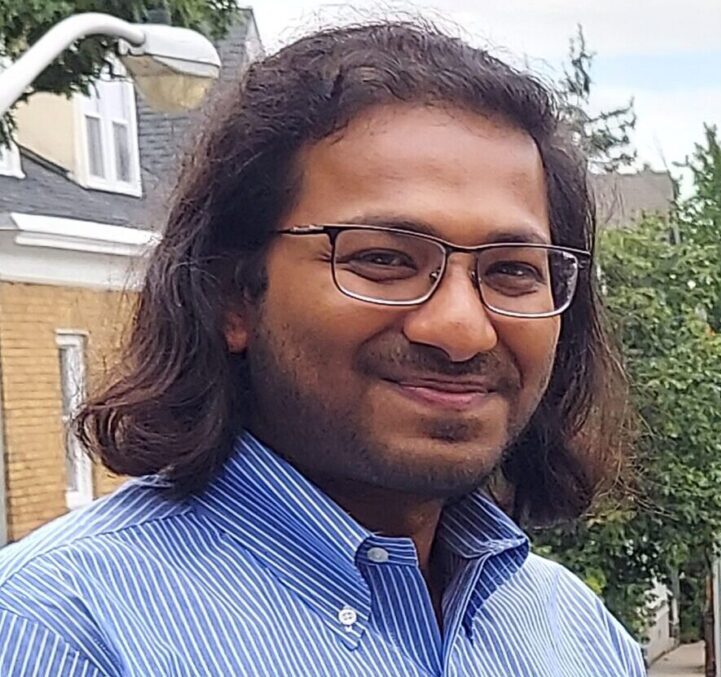 Profile photo of Professor Prateek Mittal smiling and wearing a blue shirt