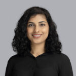 Headshot of Amna Liaqat in black top